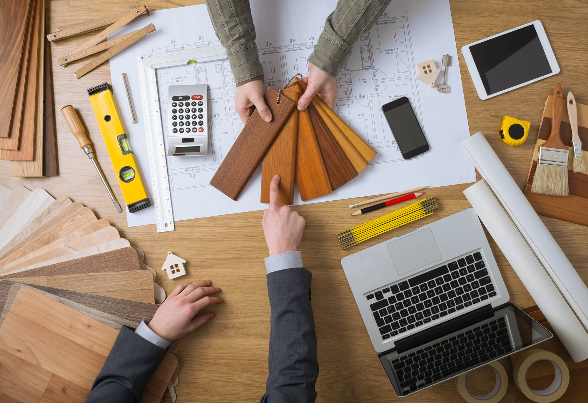 Customer choosing wood swatches Customer choosing wood swatches